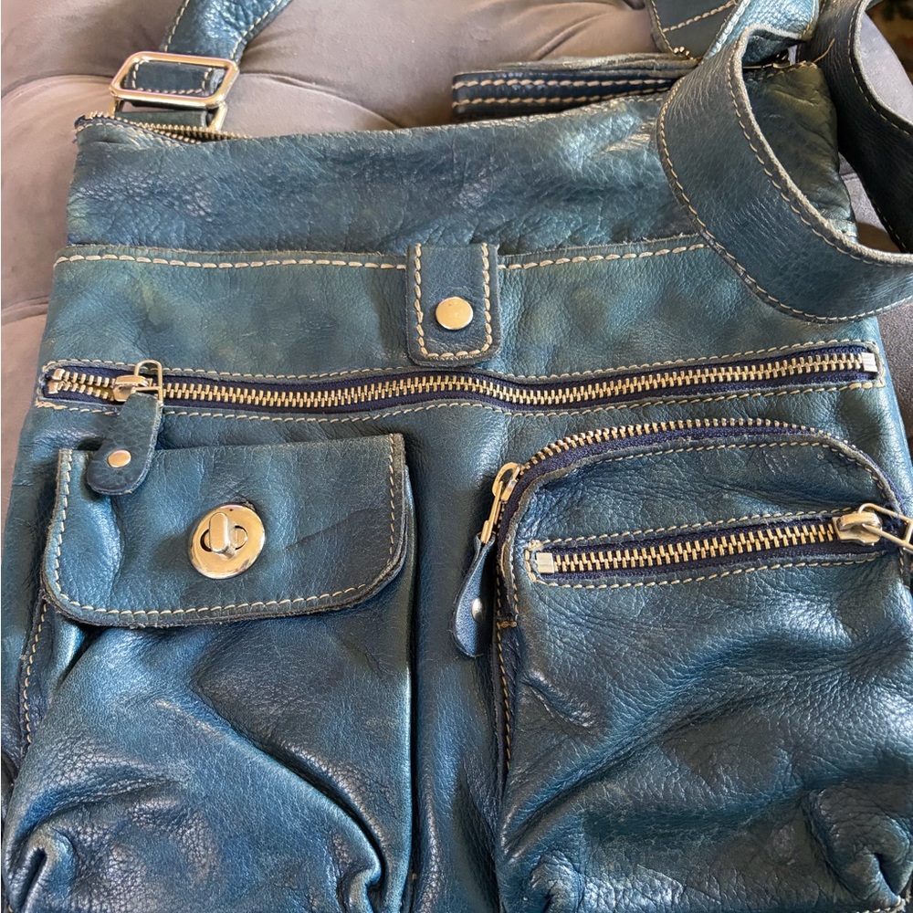 Roots Teal Crossbody Leather Bag with Multiple Pockets